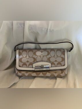 Coach Tan & Cream Signature Fabric clutch with Leather Trim